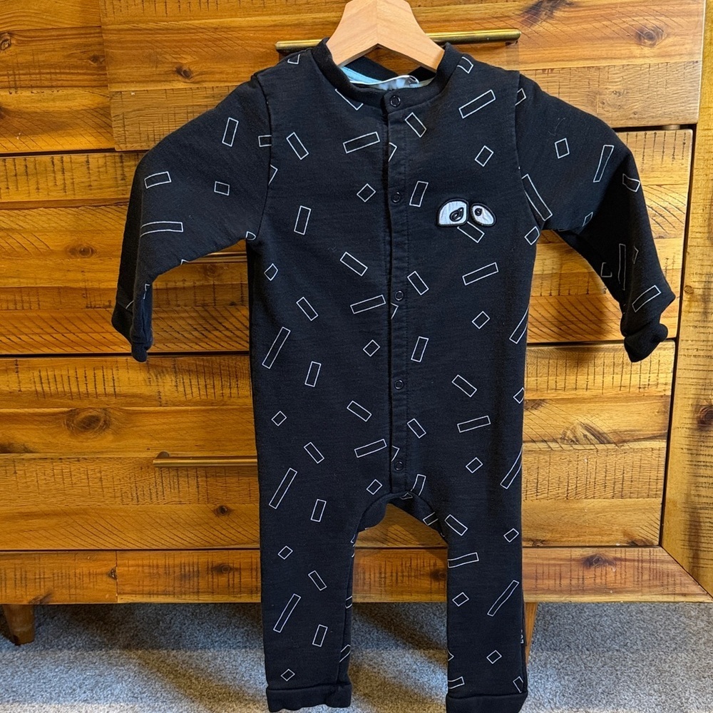 LOUD Kids Apparel Black Geometric Kids One Piece Based in East London.